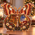 Front-view digital preview of a Christmas atlas moth amber library acrylic plaque with example name Elara integrated into the lower wing floral detail