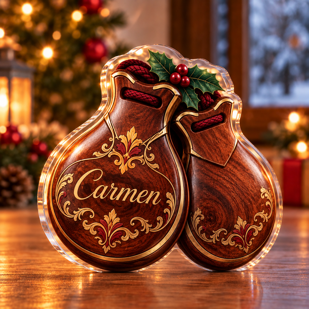 Front-view digital preview of a Christmas castanet rhythm acrylic plaque with example name Carmen integrated into the illustrated castanet shell front