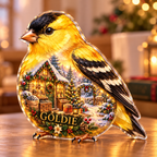 Front-view digital preview of a Christmas goldfinch amber seedcottage acrylic plaque with example name GOLDIE integrated into the lower breast feathers