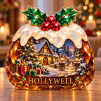 Front-view digital preview of a Christmas amber christmas pudding acrylic plaque with example name HOLLYWELL integrated into the lowest intrinsic pudding facets