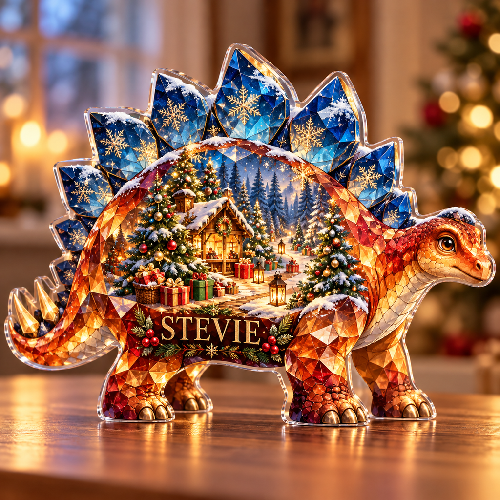 Front-view digital preview of a Christmas stegosaurus amber giftgrove acrylic plaque with example name STEVIE integrated into the lower flank facets