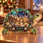 Front-view digital preview of a Christmas tortoise emerald orchard acrylic plaque with example name Olive integrated into the lower shell botanical detail