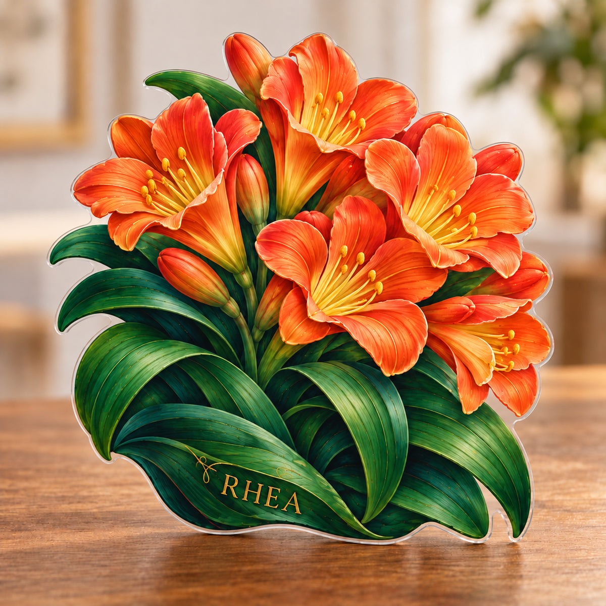 Digital preview of a clivia-blossom-shaped acrylic plaque with RHEA integrated along its lowest illustrated emerald leaf