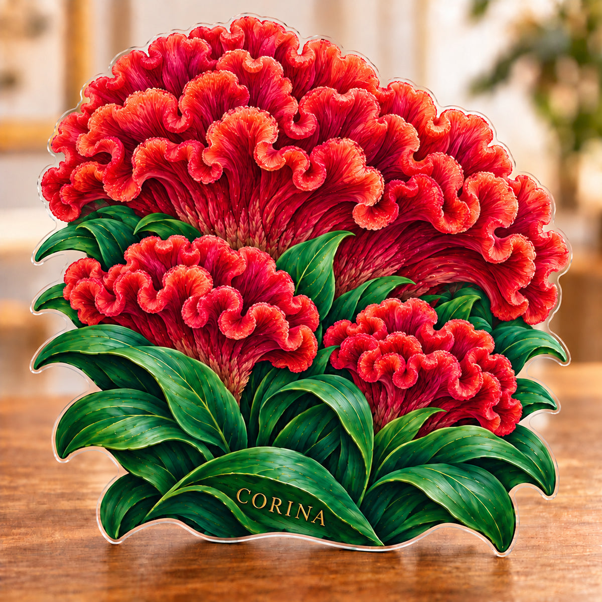 Digital preview of a crested celosia-shaped acrylic plaque with CORINA integrated along the lowest illustrated emerald leaf