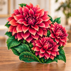 Digital preview of a dahlia-shaped acrylic plaque with DALIA integrated along its lowest illustrated emerald leaf