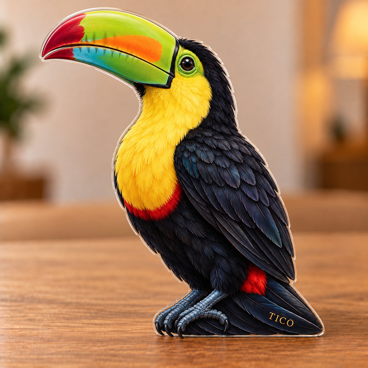 Digital preview of a keel-billed-toucan-shaped acrylic plaque with TICO integrated along its lowest illustrated tail feather