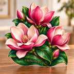 Digital preview of a magnolia-shaped acrylic plaque with MAGNOLIA integrated along its lowest illustrated emerald leaf