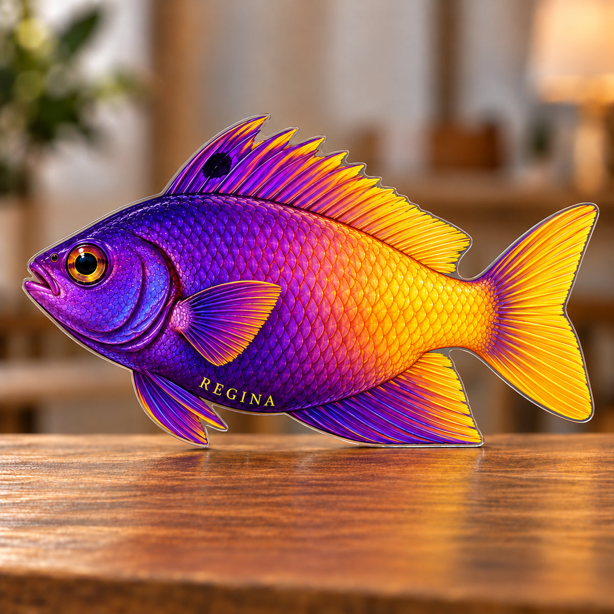 Digital preview of a royal gramma-shaped acrylic plaque with REGINA integrated along its lowest illustrated body detail