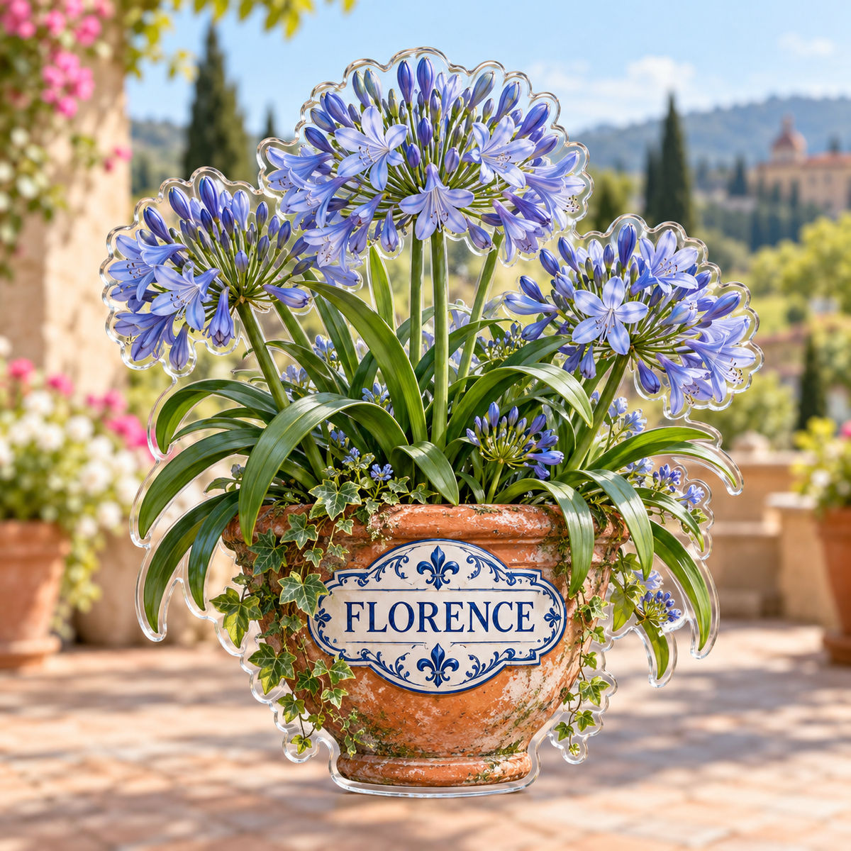 Front view of personalized agapanthus blue garden acrylic plaque with sample name FLORENCE, displayed in a softly blurred sunny garden terrace