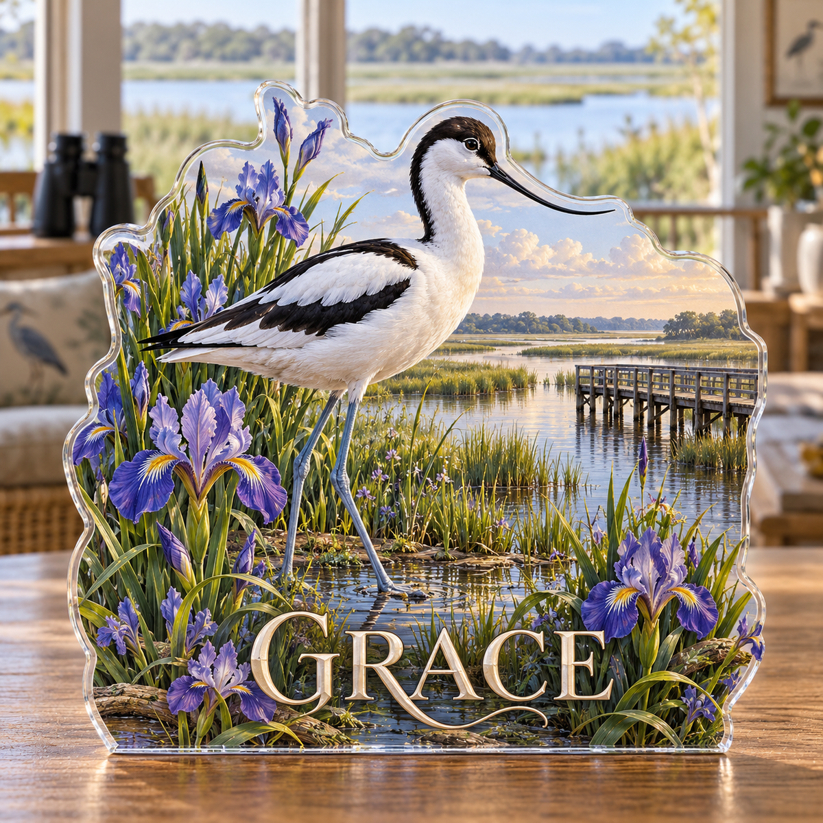Front view of personalized avocet iris marsh bridge acrylic plaque with sample name GRACE, displayed in a softly blurred waterside birdwatching room