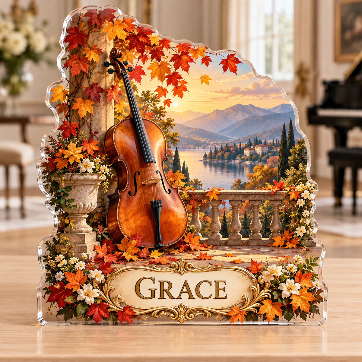 Front view of a cello autumn terrace custom-shape acrylic plaque with example name GRACE, displayed in a softly blurred elegant music room on a pale wood console