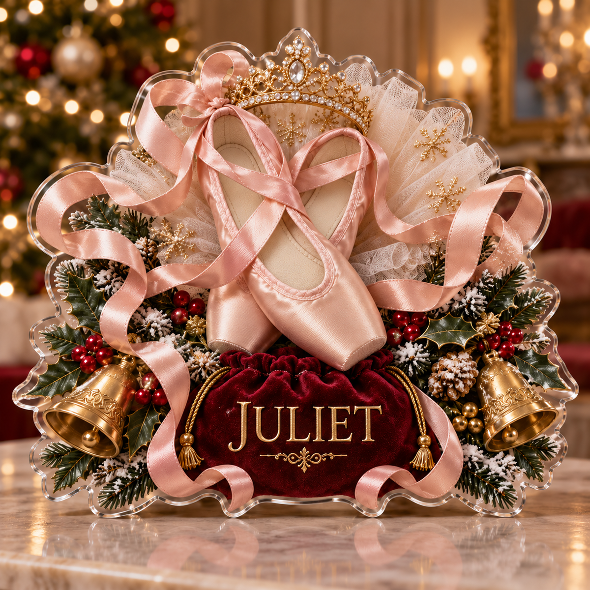 Front view of personalized christmas ballet pointe acrylic plaque with sample name JULIET, displayed in a softly blurred Christmas ballet rehearsal salon