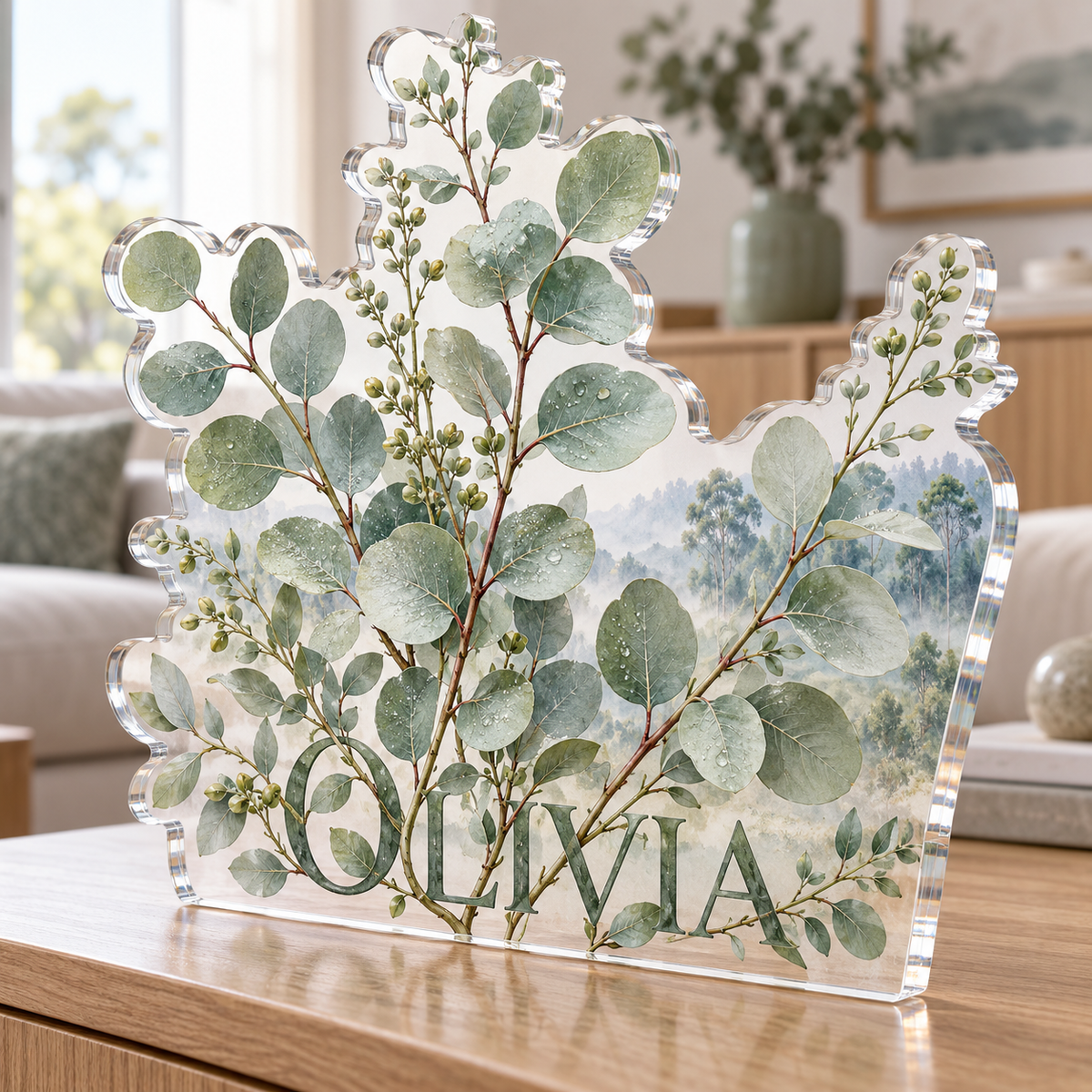 Artwork visualization: Eucalyptus sprigs — living room focal point, personalized OLIVIA, subject-shaped acrylic with printed optical 3D depth; not carved relief.
