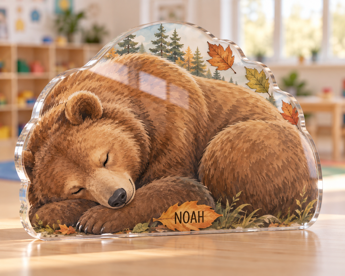 Artwork visualization: Sleeping bear leaves — preschool classroom display, personalized NOAH, subject-shaped acrylic with printed optical 3D depth; not carved relief.