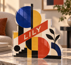 Artwork visualization: Bauhaus inspired geometry — quiet corner decoration, personalized LILY, subject-shaped acrylic with printed optical 3D depth; not carved relief.