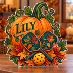 Artwork visualization: Pumpkin pickleball — family seasonal keepsake, personalized LILY, subject-shaped acrylic with printed optical 3D depth; not carved relief.