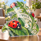 Artwork visualization: Ladybug leaves — quiet corner decoration, personalized SOPHIA, subject-shaped acrylic with printed optical 3D depth; not carved relief.