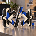 Artwork visualization: Minimal code symbols — home office desk refresh, personalized AURORA, subject-shaped acrylic with printed optical 3D depth; not carved relief.